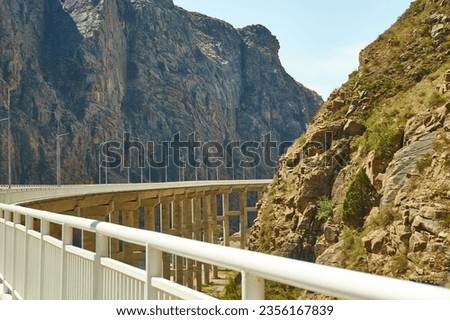 New North-South route , Bridge overpass 1000 meters canyon river Naryn, Kyrgyzstan.