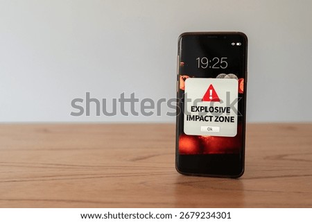 New notification "explosive impact zone" on smartphone. Concept of war zone and imminent danger.