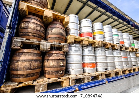 new and old beer barrels