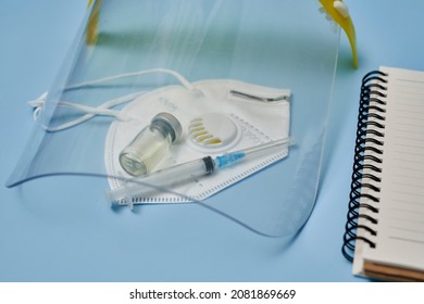 New omicron variant of Covid-19 text on notepad. Workspace or working desktop of doctor, frontliner fighting against covid. New South African variant of coronavirus, with increased reinfection risk - Shutterstock ID 2081869669