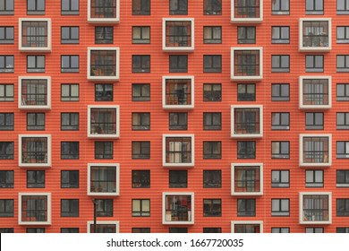 New Orange Building Facade In Housing Complex 