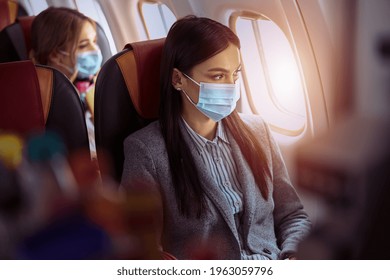 New Order In Airplane. Woman Is Sitting In Mask Before Fly