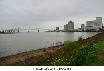 NEW ORLEANS, LOUISIANA—JANUARY 2017: Missisippi River With The Crescent Connection Bridges In New Orleans, Louisiana On A Rainy Day. 