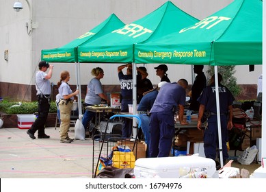 NEW ORLEANS  - AUG 31: Police And Other Members Of A  Community Emergency Response Team Gather At A Union Station Base Before Hurricane Gustav Hit The Coast On August 31, 2008 In New Orleans.