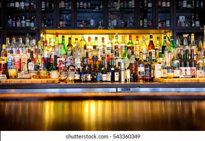 NEW ORLEANS - Dec. 25, 2016: Bottles Of Alcohol And Spirits At A Restaurant Bar. Large Variety Of Imported And Domestic Labels, Brands And Supplies For Making Cocktails And Drinks. Copy Space.