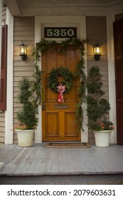 New Orleans - December 12, 2010: Wooden Front Door With Christmas Wreath In Uptown New Orleans