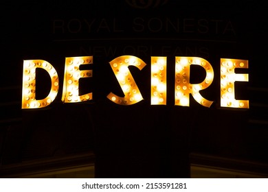 New Orleans - December 27, 2021: Desire Restaurant Bourbon Street Flashing Sign