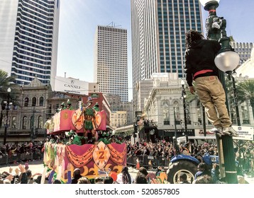 NEW ORLEANS - FEBRUARY 9, 2016: Crowd Of Tourists And Locals Along City Streets. Mardi Gras Is The Biggest Celebration The City Of New Orleans Hosts Every Year.