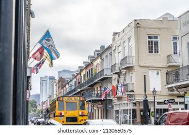 New Orleans, LA - Circa January 2022: A School Bus In Focus On A Busy, Crowded Street In The French Quarter.