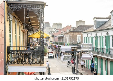 New Orleans, LA - Circa January 2022: People Dining At A Restaurant On A Balcony On Bourbon Street, In The French Quarter.