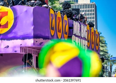 NEW ORLEANS, LA - FEBRUARY 9TH, 2016: Carnival Parade Along Bourbon Street On A Sunny Day. Mardi Gras Is The Biggest Celebration The City Hosts Every Year