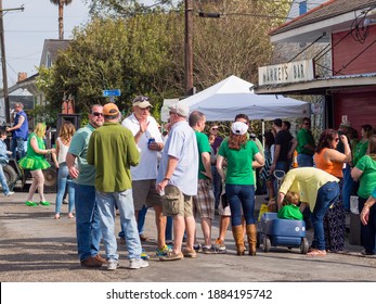 NEW ORLEANS, LA - March 9, 2014: Crowd Celebrating St. Patrick's Day In Front Of Markey's Bar