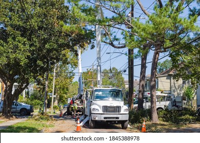 NEW ORLEANS, LA - OCTOBER 31, 2020: Utility Workers Repairing Utility Lines Damaged by Hurricane Zeta in Uptown Neighborhood