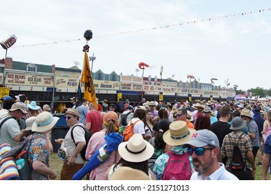New Orleans, LA  United States - April 30, 2022: People wait in line for local cajun cuisine at the 2022 New Orleans Jazz  Heritage Festival.