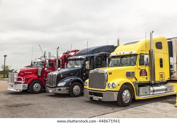 NEW ORLEANS, LA, USA - APR 17, 2016: Freightliner, Peterbilt and