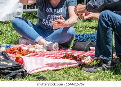 NEW ORLEANS, LA, USA - APRIL 14, 2019: People Peeling And Eating Crawfish At French Quarter Festival (Free) In New Orleans