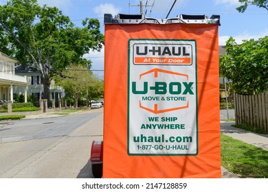 NEW ORLEANS, LA, USA - APRIL 17, 2022: U-Haul U-Box trailer parked on street in uptown neighborhood