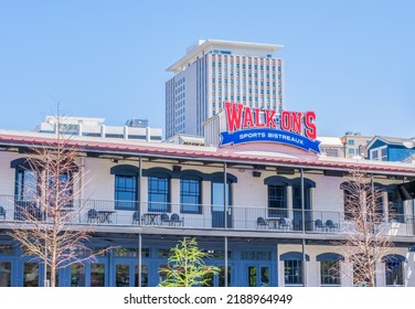 NEW ORLEANS, LA, USA - APRIL 3, 2022: Front Of Walk-On's Sports Bistreaux On Poydras Street Near The Superdome