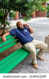 NEW ORLEANS, LA, USA - August 8, 2017: City Worker Taking A Break On A Bench In Front Of City Hall