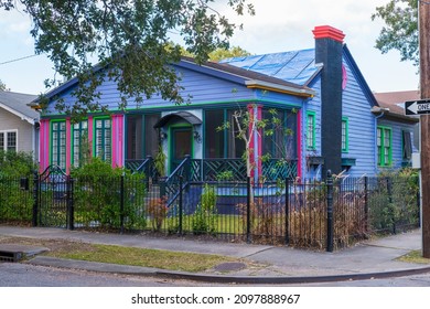 NEW ORLEANS, LA, USA - DECEMBER 1, 2021: Very Colorful Home In Carrollton Neighborhood With Blue Tarp On The Roof