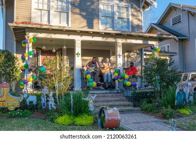 NEW ORLEANS, LA, USA - FEBRUARY 6, 2022: Rock Band Performs On Front Porch Of Home In Uptown Neighborhood During Block Party