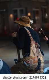 New Orleans, LA USA - February 9th, 2022: Musician Playing On Street Corner At Night