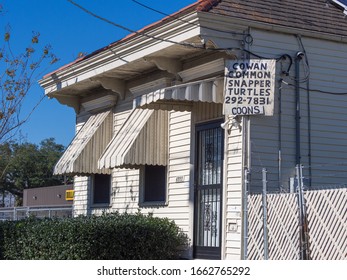 NEW ORLEANS, LA, USA - JANUARY 16, 2016: House With Sign Advertising The Sale Of Turtle Meat And Raccoon Meat In The Ninth Ward