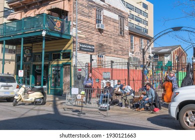 NEW ORLEANS, LA, USA - JANUARY 17, 2021: Traditional Jazz Band Playing On The Sidewalk Outside The Spotted Cat Music Club