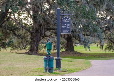 NEW ORLEANS, LA, USA - JANUARY 8, 2022: 12th Hole Sign And Ball Washer At Audubon Park Golf Course