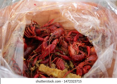 New Orleans, LA, USA - June 25, 2019: A Look Into The Bag Of Vietnamese Cajun Crawfish At TD Seafood & Pho House.