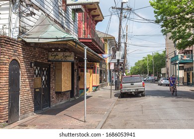 NEW ORLEANS, LA, USA - MARCH 28, 2020: Café Negril Restaurant- Bar And Live Music Venue Boarded Up For Social Distancing Mandate By City Of New Orleans