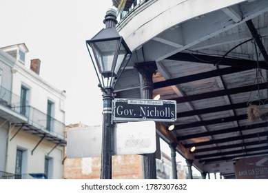 NEW ORLEANS, L.A. / USA - MARCH, 8 2020: Governor Nicholls St, Rue De L'Hopital, Street Sign, On A Metal Light Post, Located In The French Quarter In NOLA.