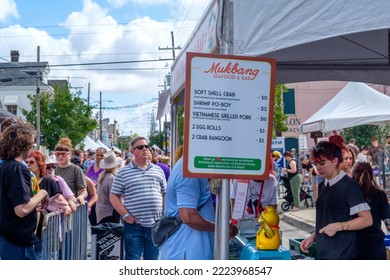NEW ORLEANS, LA, USA - NOVEMBER 6, 2022: Mukbang Seafood And Bar Food Booth And Gathering Of People At The Free Oak Street Po-Boy Festival