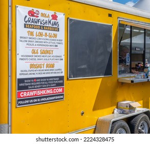 NEW ORLEANS, LA, USA - NOVEMBER 6, 2022: Side View Of Nola Crawfish King Food Truck Showing Order Window And Menu At The Free Oak Street Po-Boy Festival 