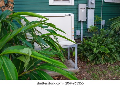 NEW ORLEANS, LA, USA -SEPTEMBER 18, 2021: Home Backup Generator On Side Of House