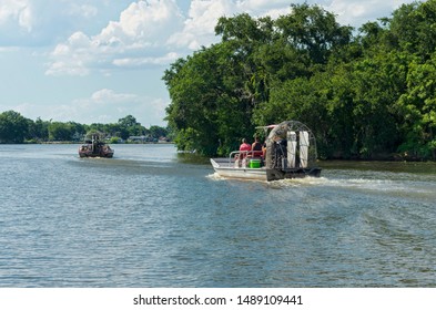 NEW ORLEANS, LA/USA –JUNE 13, 2019: Airboat Tours Begin Their Journey Toward Swamps And Bayou Of Mississippi River Delta Region Outside New Orleans. 