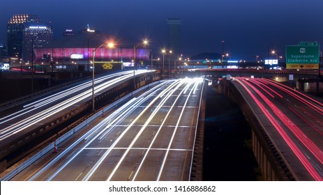 New Orleans, Louisiana - August 1, 2014: Freeway Traffic Passing Louisiana Superdome