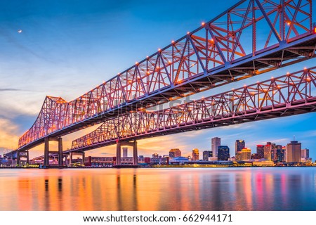 New Orleans, Louisiana, USA at Crescent City Connection Bridge over the Mississippi River.