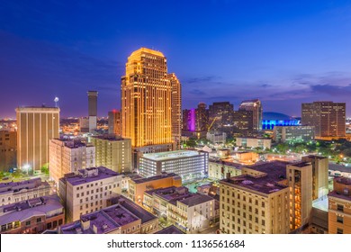 New Orleans, Louisiana, USA downtown CBD skyline at night. - Powered by Shutterstock