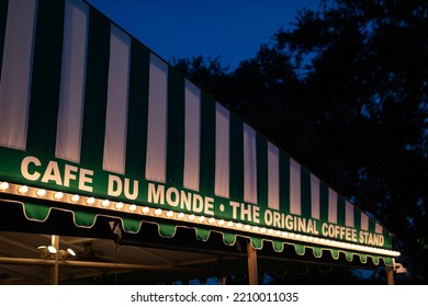 New Orleans, Louisiana USA - June 2 2022: Cafe Du Monde Restaurant Sign At Night In The French Quarter Of New Orleans