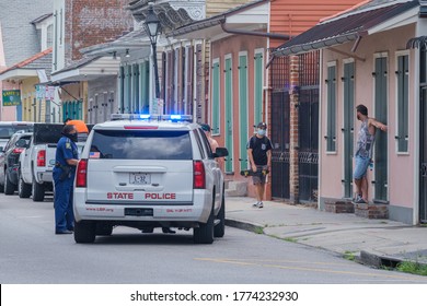 New Orleans, Louisiana/USA - 7/8/2020: State Police Car Pulled Over In French Quarter To Make An Arrest, With Onlookers