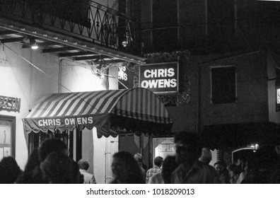 NEW ORLEANS – SEPTEMBER 11, 1979: Chris Owens Sign In Bourbon Street. Vintage Picture Taken In 1979.