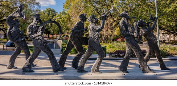 New Orleans, United States: Febraury 27, 2020: Statue Of Jazz Band Marches Along Louis Armstrong Park