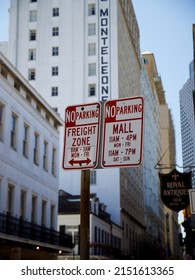 NEW ORLEANS, UNITED STATES - Mar 31, 2022: A Vertical Shot Of Parking Restriction Signs On Royal Street During Daytime In New Orleans, United States