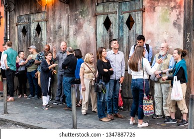 New Orleans, USA - April 22, 2018: Many People Standing In Line Queue Waiting For Preservation Hall In Old Town St Peter Pierre Street In Louisiana Famous Town City