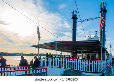 New Orleans, USA - Dec 11, 2017: Onboard The Steamboat Natchez. Passengers Enjoy The Mississippi River Cruise And The Setting Sun.