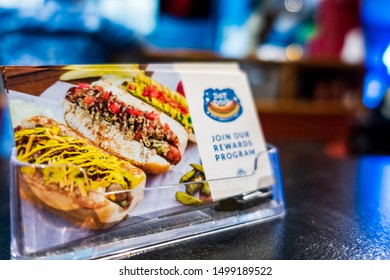 New Orleans, USA - Dec 11, 2017: Cards On A Rack Sitting On A Counter At The Dat Dog Hot Dog Restaurant Along Frenchmen Street, Urging Customers To Join Their Rewards Program By Submitting A Card.