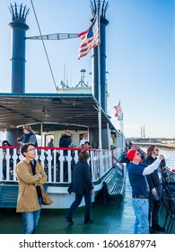 New Orleans, USA - Dec 11, 2017: Onboard The Steamboat Natchez. Passengers Enjoy The Mississippi River Cruise And The Surrounding Sights.