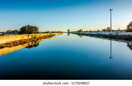 New Orleans, USA - Nov 28, 2017: Afternoon View Of The 17th Street Canal Around The West End Area. This Canal Forms Part Of The City's Flood Control Mechanism.