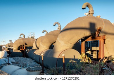 New Orleans, USA - Nov 28, 2017: View Of The 17th Street Canal Pump Station. Features A Series Of Large Metal Pipes With Relief Valves On Top. Forms Part Of The City's Flood Control Mechanism.